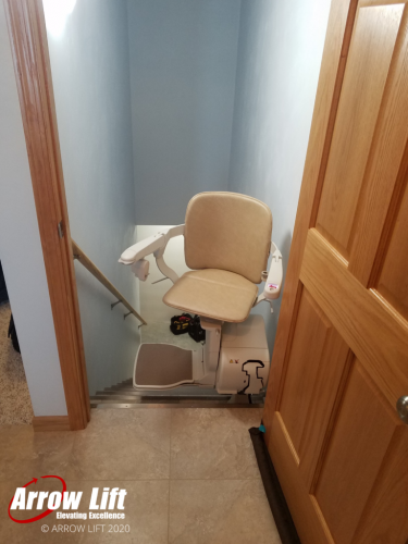 Rotated stair lift chair at the top of stairs - Arrow Lift 2020