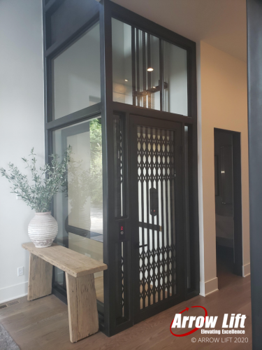 Modern Home Elevator with glass and scissor door - Arrow Lift 2020