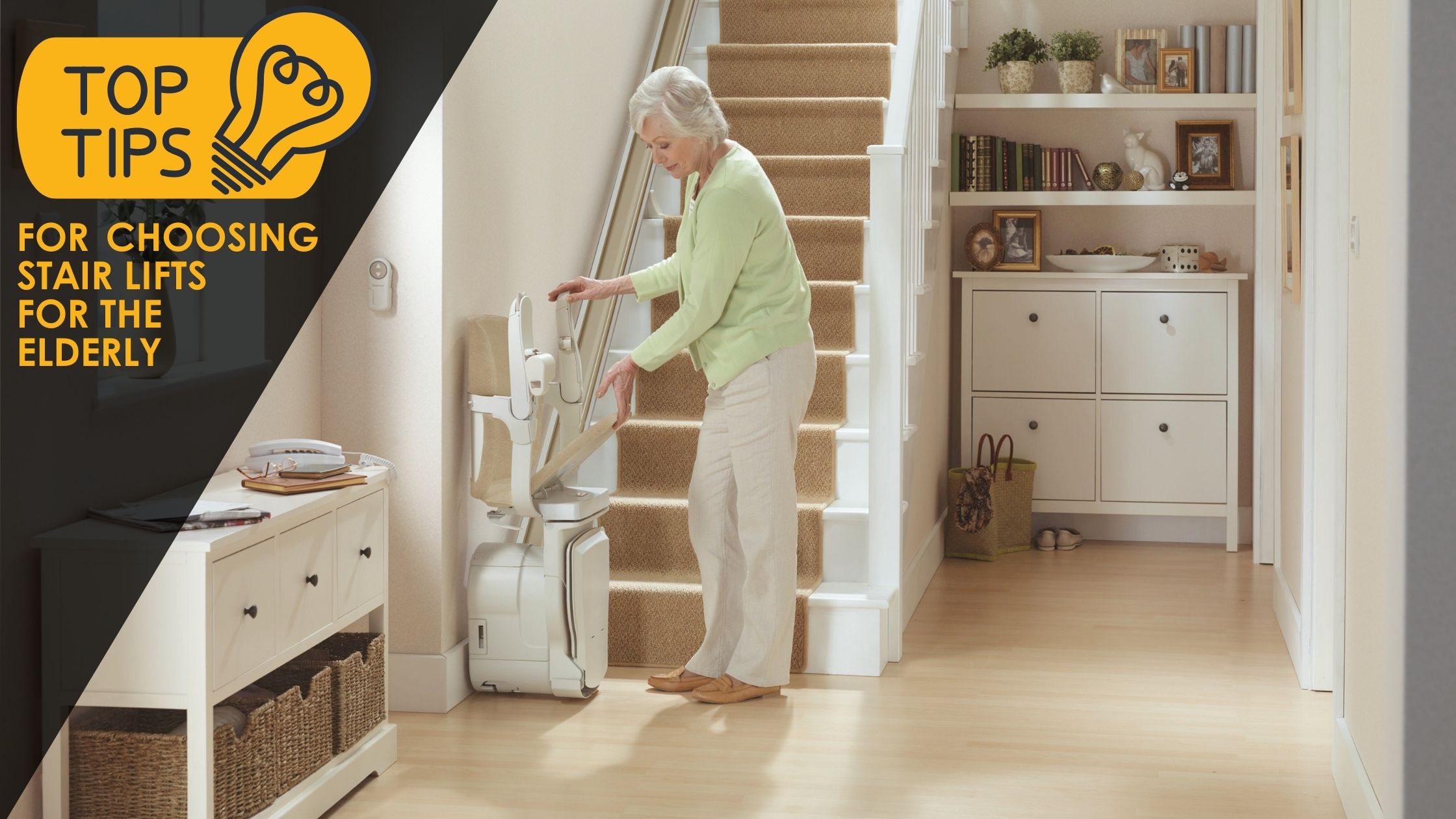 Top Tips for Choosing Stair Lifts for the Elderly; light bulb icon; photo of woman folding down a stair lift chair