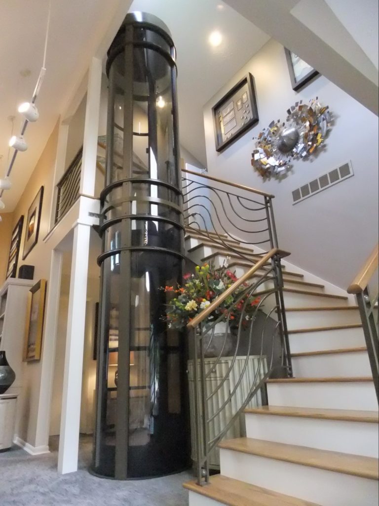 Pneumatic vacuum elevator pictured at bottom landing in home