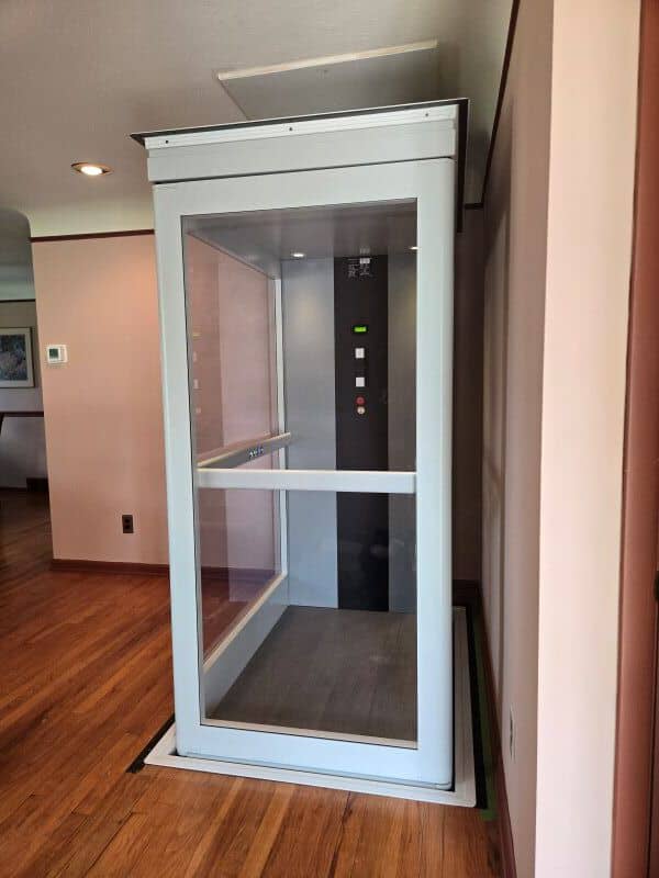 shaftless home elevator with glass walled cab