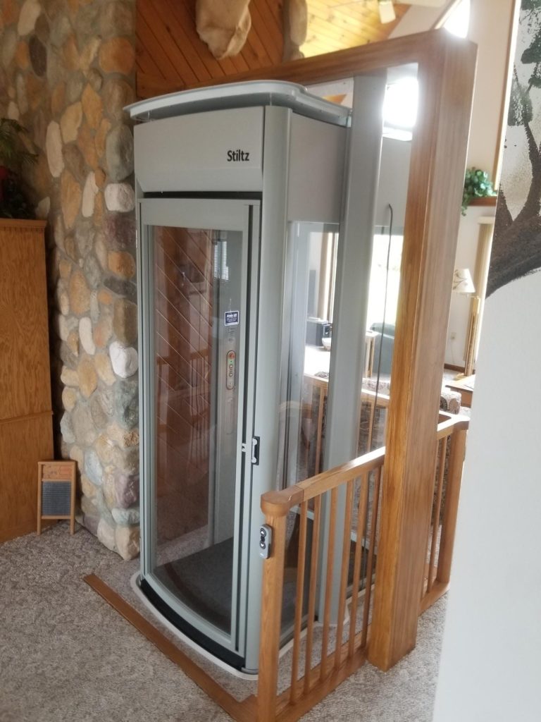 Shaftless home elevator with custom wood framing 