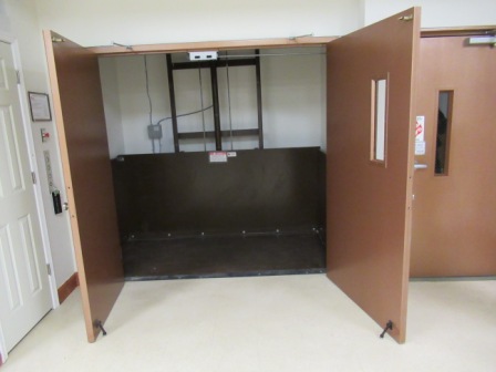 Casket Lift in shaftway with enclosed doors