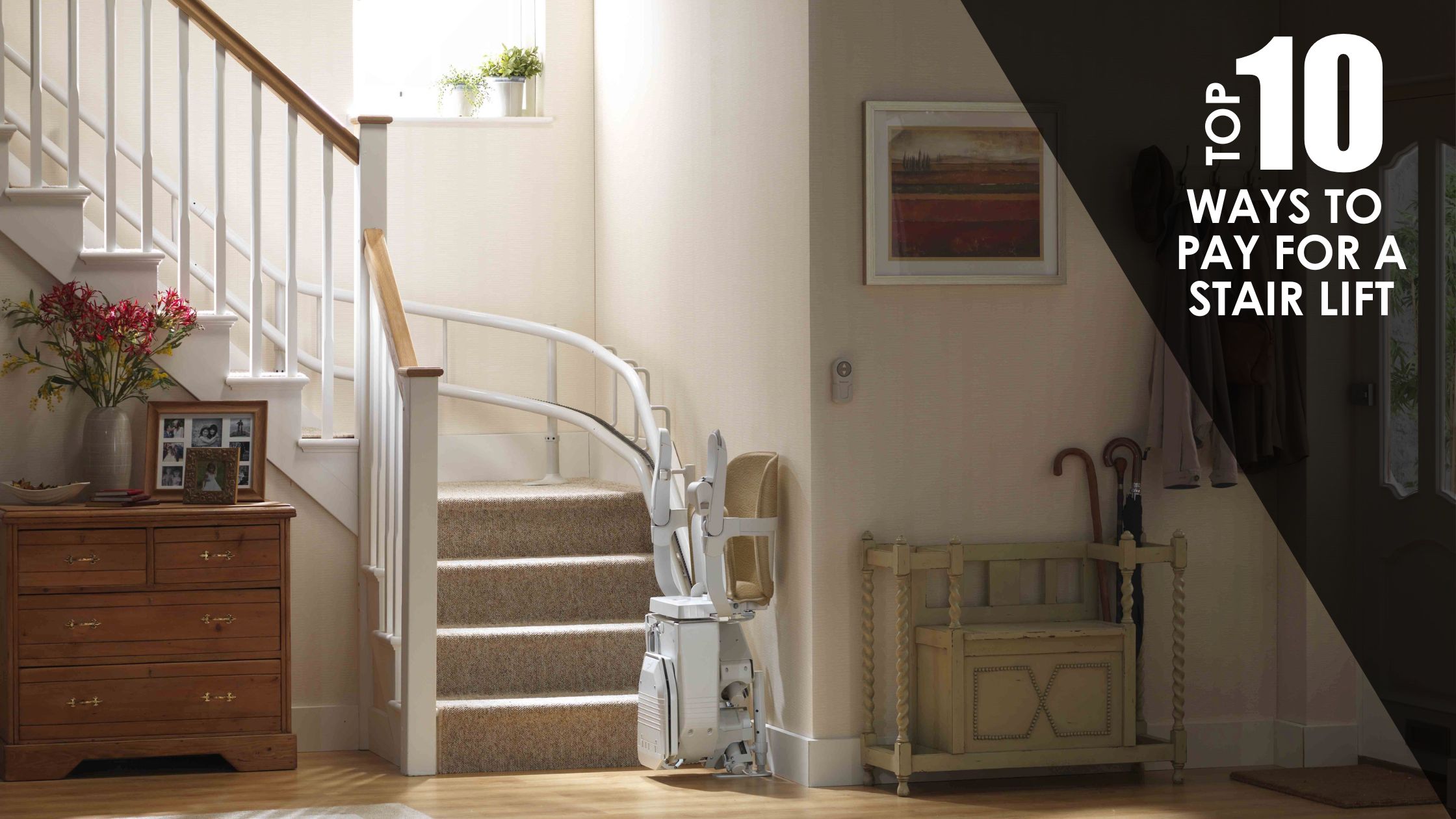 An elegant home staircase with a modern curved stair lift installed creates an accessible living environment.