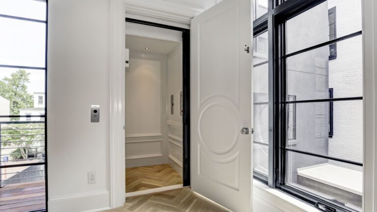Open door to a custom, luxury home elevator