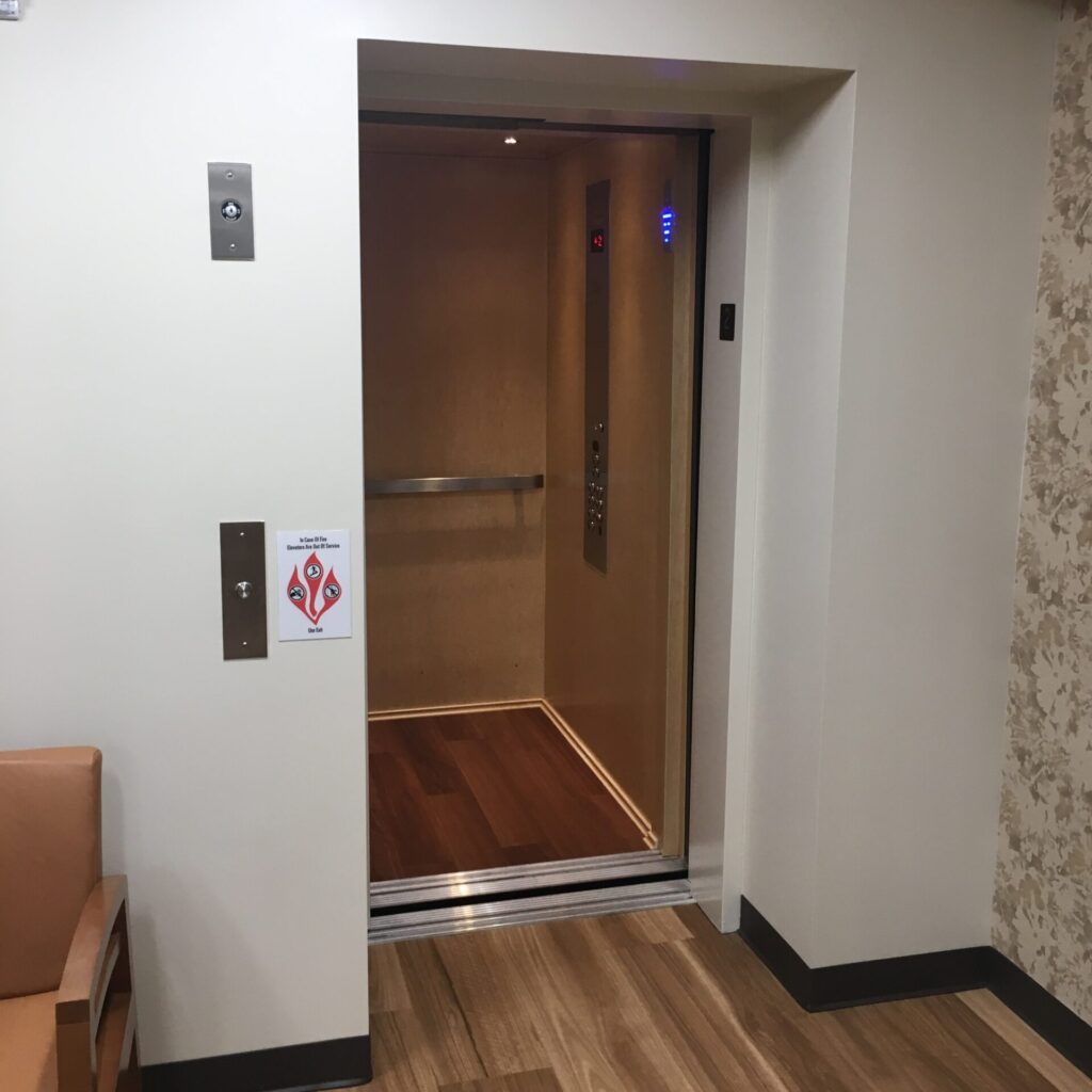 This limited use/limited application elevator, or LULA lift, fits seamlessly into a commercial space to provide mobility assistance between floors.