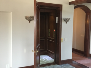 Home Elevator with dark wood - Arrow Lift 2020
