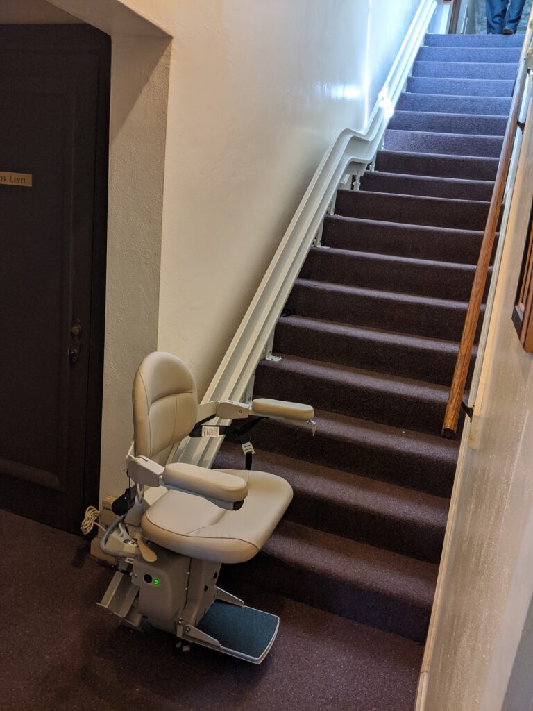 Curved stair lift on straight stairs - Arrow Lift