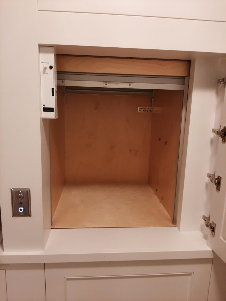 a dumbwaiter with the door open