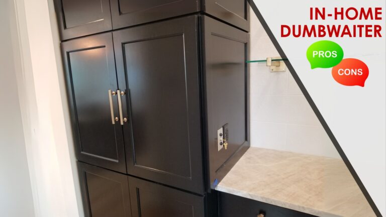 Modern in-home dumbwaiter with black cabinetry and marble countertop, featuring pros and cons of installing a residential dumbwaiter.