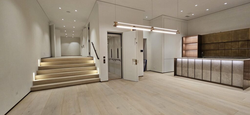 Home Elevator with mirror paneling in a SoCal home