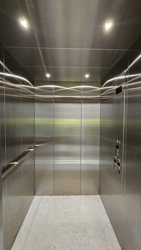 LULA elevator with stainless steel interior in a school