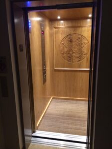 LULA Elevator with custom wood engraving that mimics stained glass