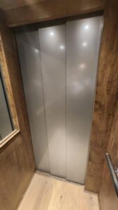SSD sliding elevator car door